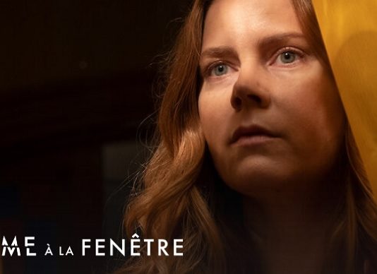 la femme a la fenetre heure